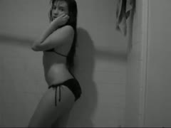 Frisky minx Amanda is hot and dirty while dancing in the restroom.